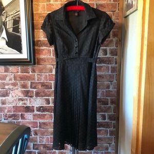 black polka dot dress . Absolutely gorgeous. Pin up style . Sheer sleeves.